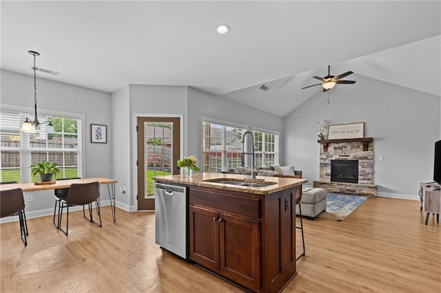 419 Highland Pointe Dr, Alto, GA 30510 - kitchen featuring dishwasher, a sink, light wood finished floors, a fireplace, and lofted ceiling