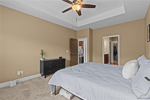 419 Highland Pointe Dr, Alto, GA 30510 - carpeted bedroom featuring baseboards, a raised ceiling, a walk in closet, and ceiling fan