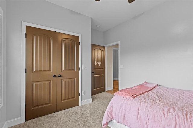 419 Highland Pointe Dr, Alto, GA 30510 - carpeted bedroom featuring baseboards, a closet, and ceiling fan