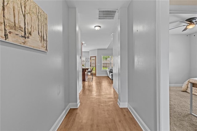 419 Highland Pointe Dr, Alto, GA 30510 - hallway with baseboards and wood finished floors
