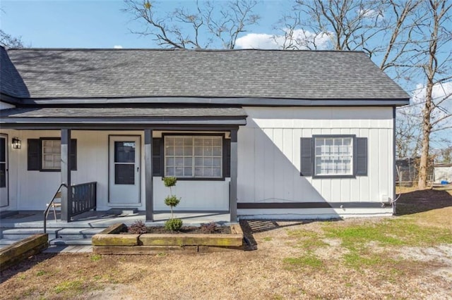 5119 NE Worsham St, Covington, GA 30014 - view of front of property featuring roof with shingles and covered porch