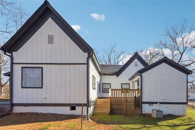 5119 NE Worsham St, Covington, GA 30014 - view of property exterior featuring a deck, a lawn, and crawl space