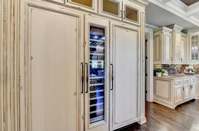 interior space featuring decorative backsplash and wood finished floors