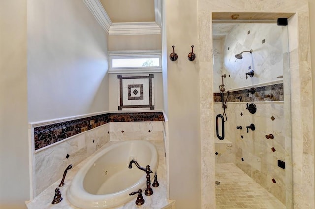 full bath featuring ornamental molding, a garden tub, and a stall shower