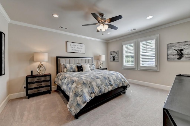 carpeted bedroom with crown molding, baseboards, and visible vents