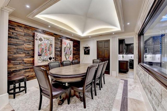 dining area with crown molding, recessed lighting, marble finish floor, and a tray ceiling
