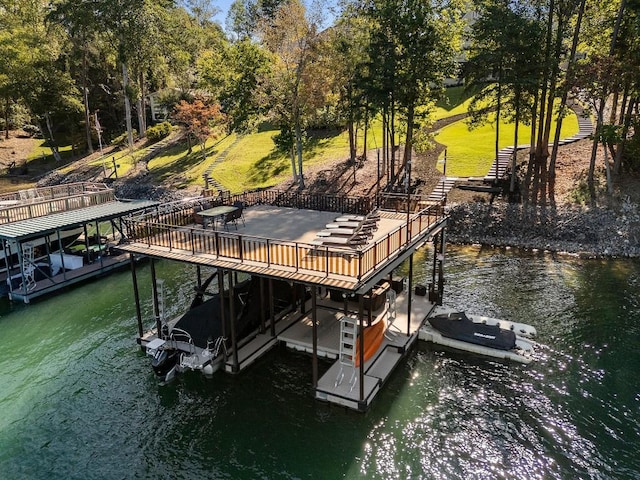 view of dock with boat lift and a water view