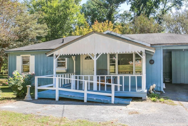 view of front of home with board and batten siding and a porch