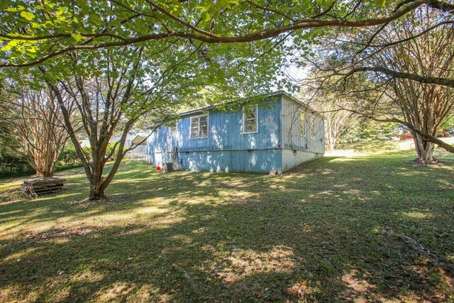 exterior space with a yard and crawl space