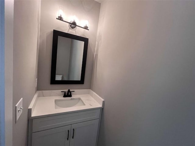 half bathroom with vanity