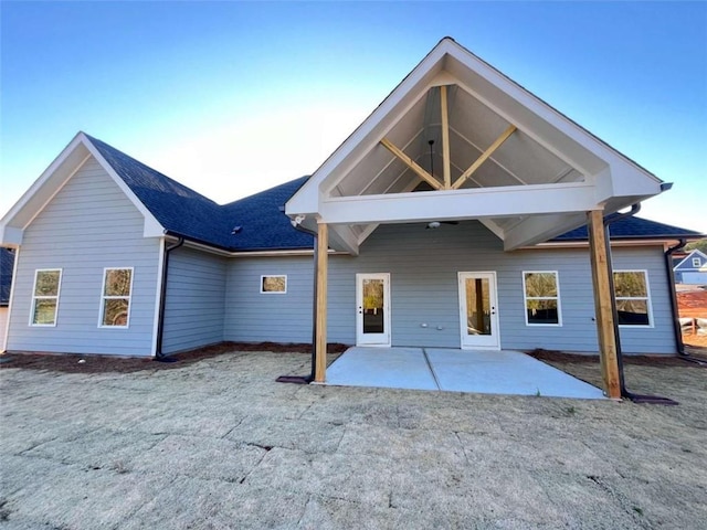 back of house with a patio area