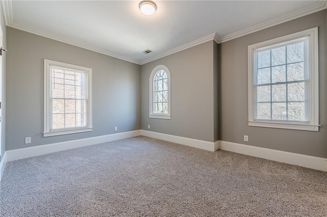 unfurnished room with light carpet, baseboards, and ornamental molding