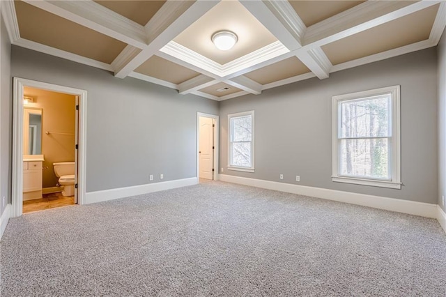 unfurnished bedroom with baseboards, coffered ceiling, ornamental molding, beamed ceiling, and light colored carpet