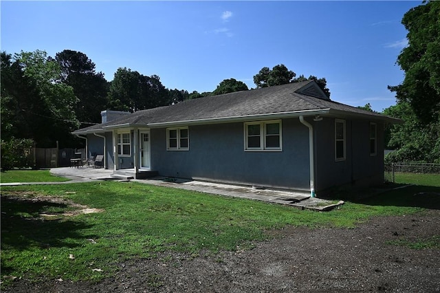 1621 Oak Rd, Snellville, GA 30078 - rear view of property featuring a patio and stucco siding