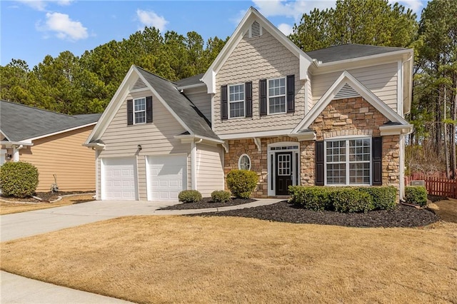 view of front of house with a garage, driveway, stone siding, and a front yard