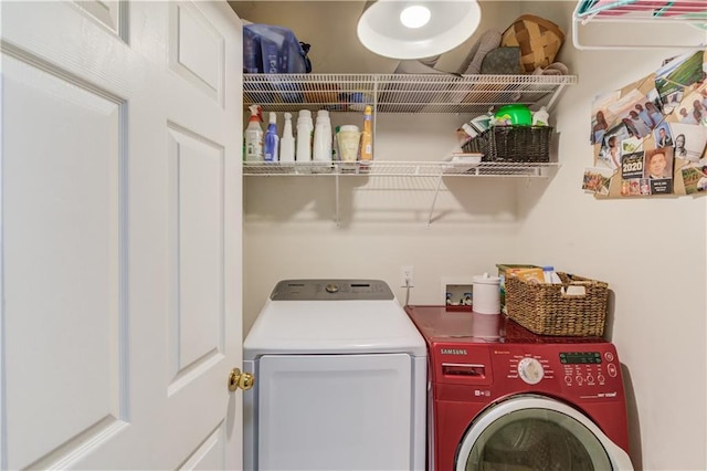 washroom with washer and clothes dryer