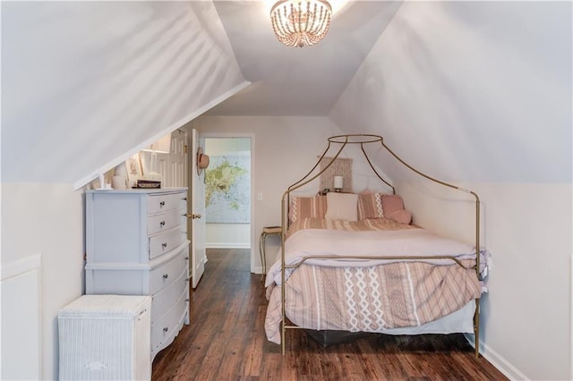 bedroom featuring dark hardwood / wood-style floors and vaulted ceiling