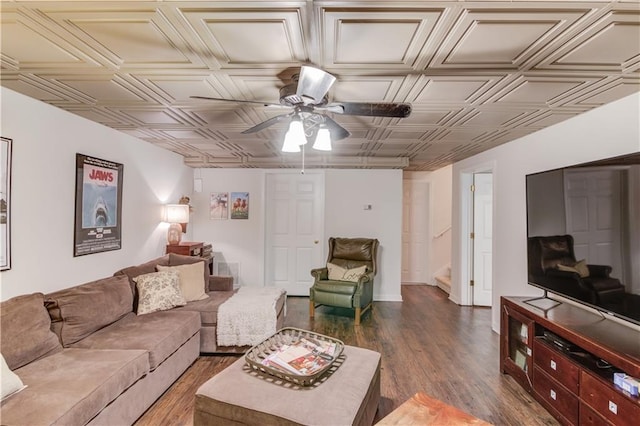 living room with hardwood / wood-style flooring and ceiling fan