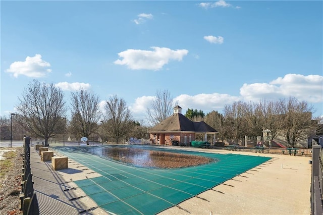 view of swimming pool featuring a patio area