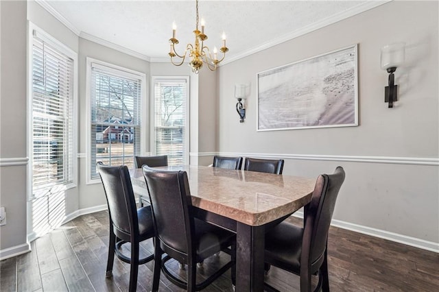 dining space with crown molding, dark hardwood / wood-style flooring, and an inviting chandelier