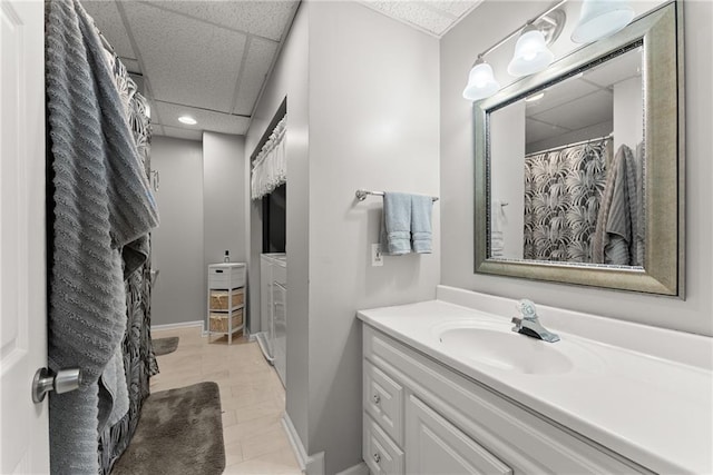 165 Grant Ford Dr, Dawsonville, GA 30534 - bathroom featuring vanity, a paneled ceiling, tile patterned floors, baseboards, and recessed lighting