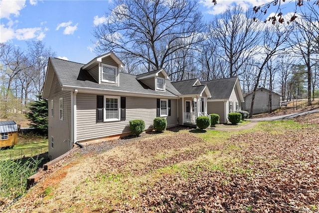 165 Grant Ford Dr, Dawsonville, GA 30534 - cape cod home featuring a porch