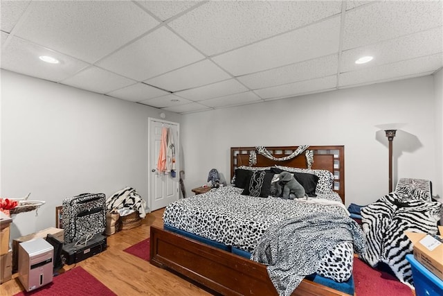 165 Grant Ford Dr, Dawsonville, GA 30534 - bedroom with wood finished floors, recessed lighting, and a paneled ceiling