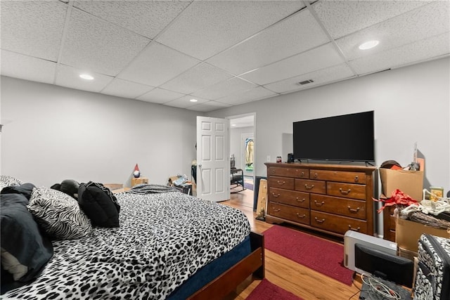 165 Grant Ford Dr, Dawsonville, GA 30534 - bedroom featuring wood finished floors, a drop ceiling, and recessed lighting
