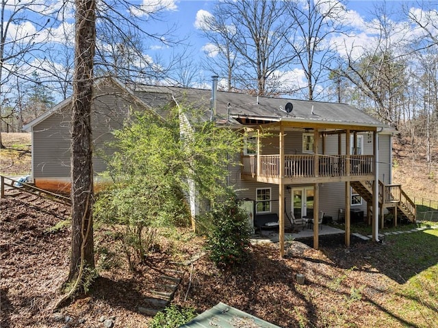 165 Grant Ford Dr, Dawsonville, GA 30534 - rear view of house with stairs, a wooden deck, a patio, and french doors