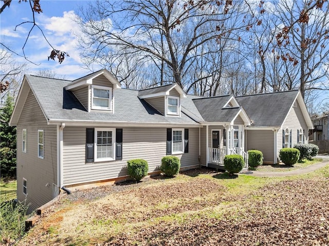 165 Grant Ford Dr, Dawsonville, GA 30534 - cape cod house featuring a porch