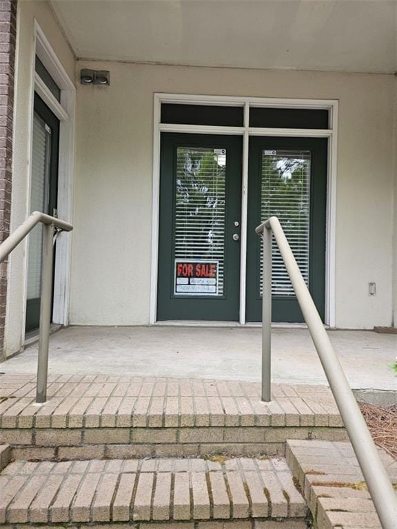 390 17th St NW Unit 2025, Atlanta, GA 30363 - property entrance with stucco siding