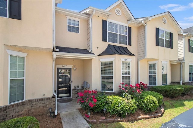 7324 Bridlewood Ct, Jonesboro, GA 30236 - townhome / multi-family property with stucco siding and brick siding