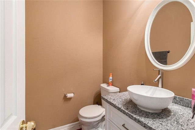 7324 Bridlewood Ct, Jonesboro, GA 30236 - half bathroom featuring vanity and toilet
