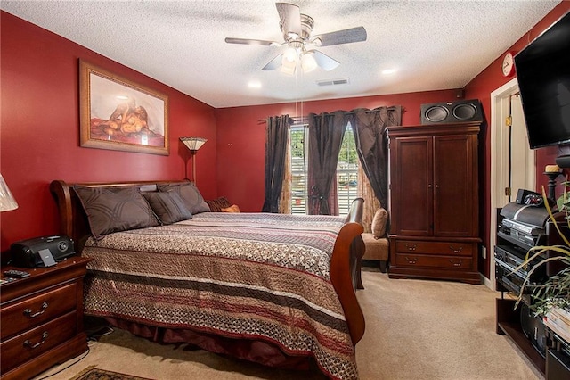 7324 Bridlewood Ct, Jonesboro, GA 30236 - bedroom with light colored carpet, a textured ceiling, and ceiling fan