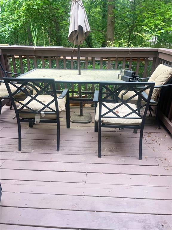 7324 Bridlewood Ct, Jonesboro, GA 30236 - deck featuring outdoor dining area