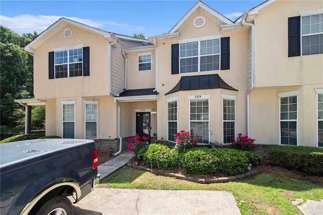 7324 Bridlewood Ct, Jonesboro, GA 30236 - view of property featuring stucco siding