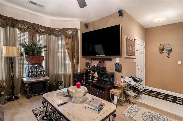 7324 Bridlewood Ct, Jonesboro, GA 30236 - living room featuring a ceiling fan and tile patterned floors