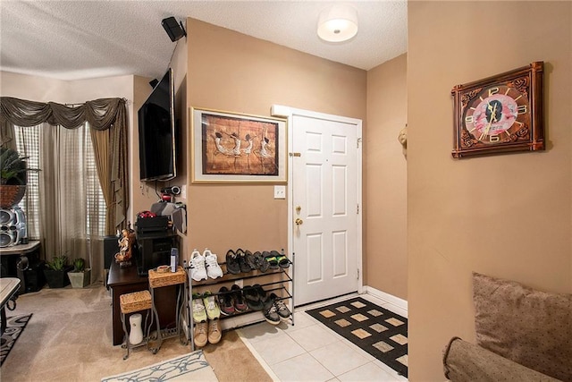 7324 Bridlewood Ct, Jonesboro, GA 30236 - foyer with a textured ceiling