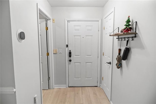 doorway to outside featuring light hardwood / wood-style flooring