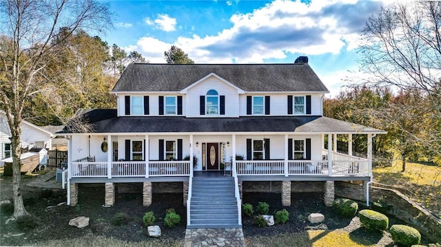 country-style home featuring a porch