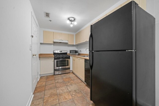 1501 Clairmont Rd Unit 223, Decatur, GA 30033 - kitchen with sink and black appliances