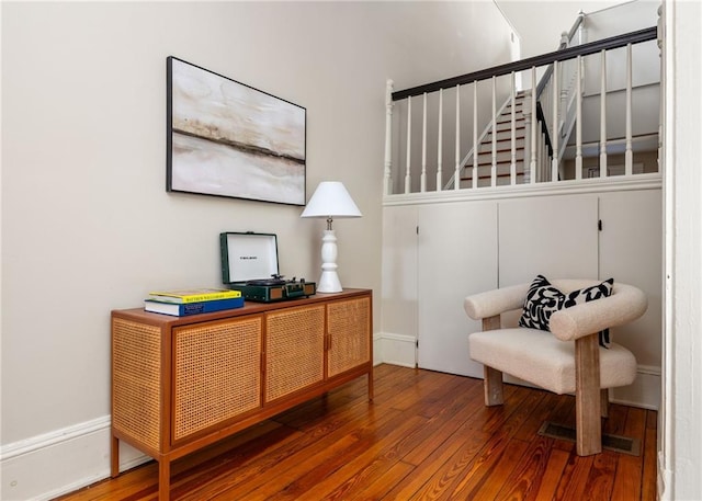 sitting room featuring wood-type flooring