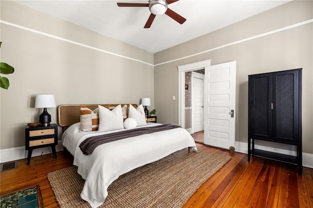 bedroom featuring dark hardwood / wood-style flooring and ceiling fan