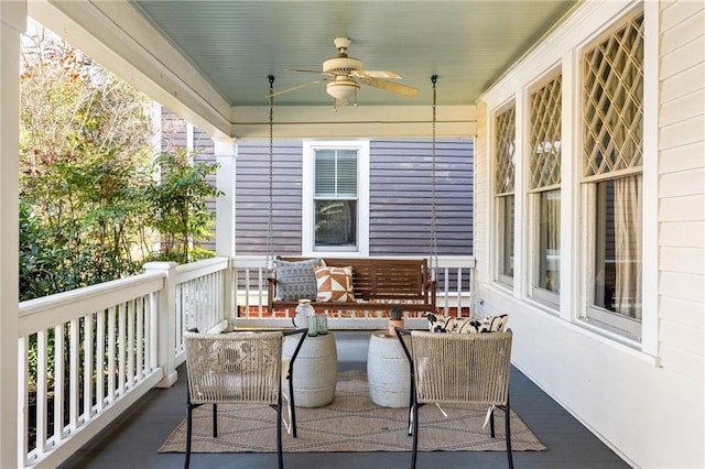 exterior space featuring ceiling fan