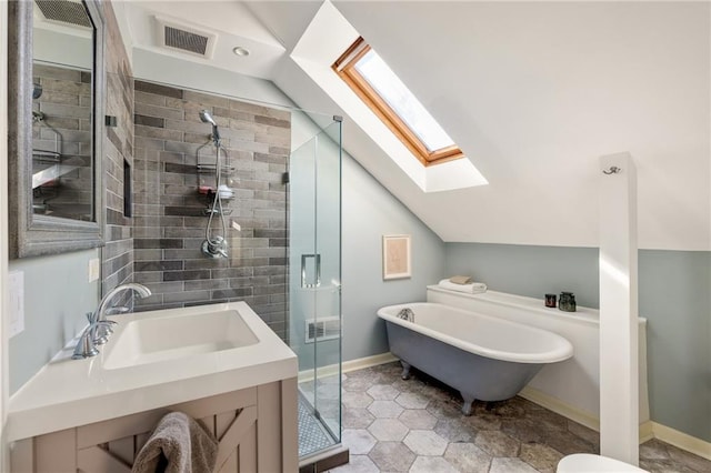 bathroom with shower with separate bathtub, vaulted ceiling with skylight, and vanity