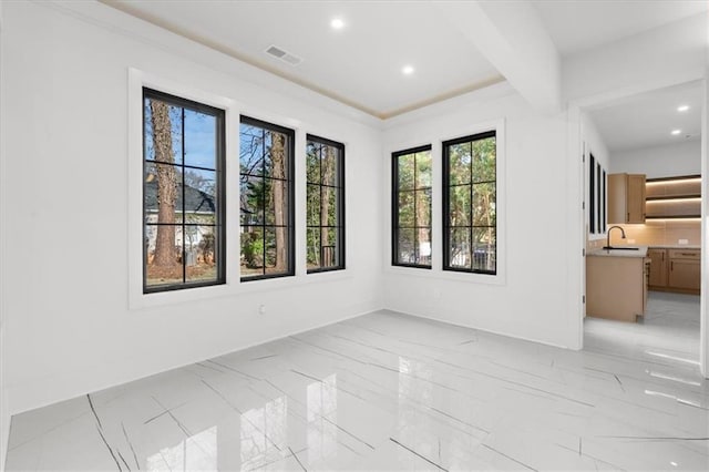 unfurnished living room featuring light wood-type flooring, visible vents, a large fireplace, and recessed lighting