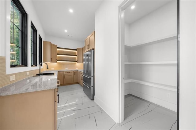 unfurnished living room featuring recessed lighting, light wood-style flooring, stairs, and a large fireplace