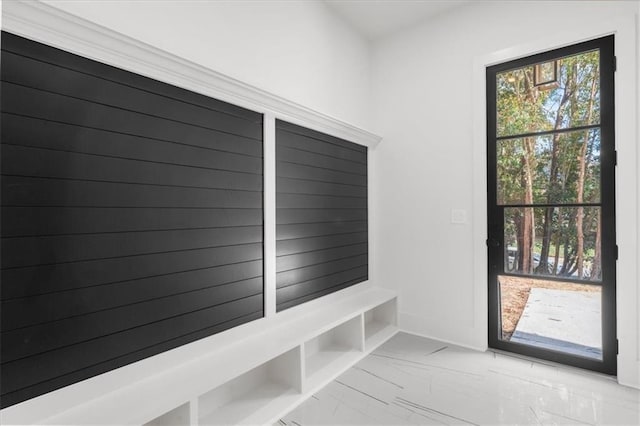 mudroom with marble finish floor