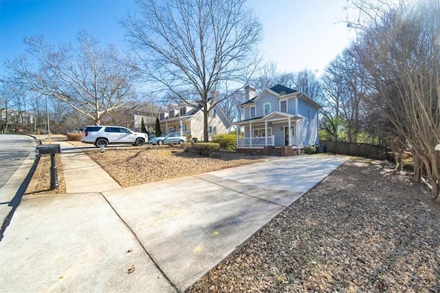 view of yard with covered porch