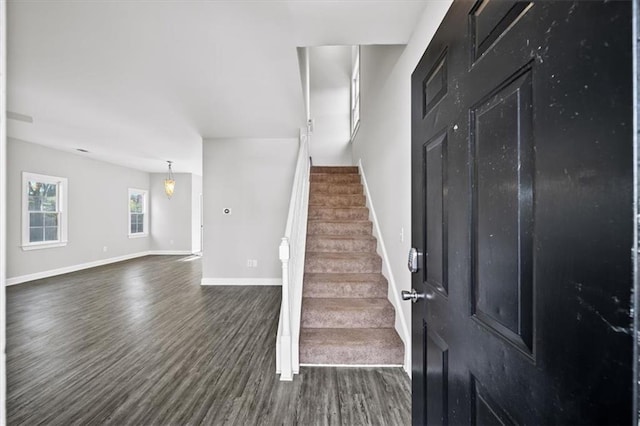 entryway featuring dark wood-type flooring